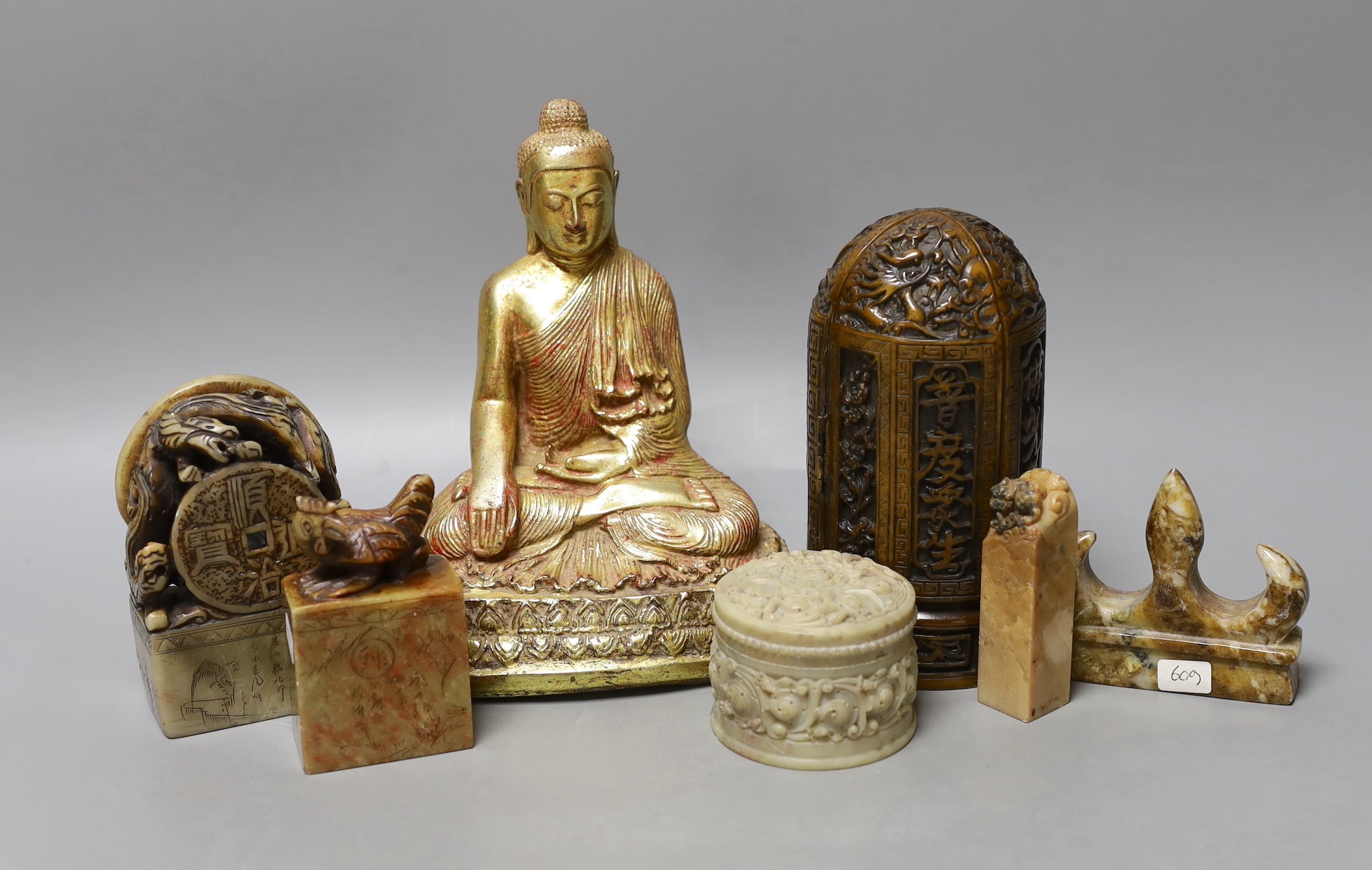 A group of Chinese soapstone carvings, a composition portable shrine and a Buddha figure (7)